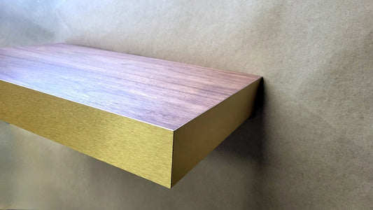 Walnut floating shelf with brushed brass edges, elegant wooden shelf for modern home decor